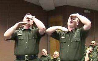Police Officers Show Off Their Human Bagpipe Skills